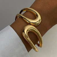 Nouveau bracelet asymétrique ajouré pour femme, double ligne géométrique, en alliage de zinc plaqué or, tendance, simple et élégant