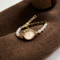 Montre à quartz pour femme, style ancien, bracelet perles, luxe léger, élégance et tempérament
