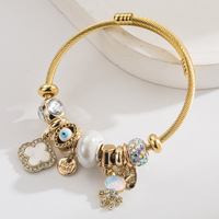 Bracelet à breloques ajustable en alliage électroplaqué, motif trèfle à quatre feuilles et lapin, avec lettres, best-seller transfrontalier