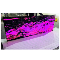 Table basse sur mesure de luxe moderne en onyx rose poli avec éclairage LED rétroéclairé pour villa