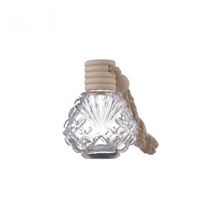 Diffuseur de parfum pour voiture en verre en forme de coquille, flacon suspendu, désodorisant, bouchon en bois, logo personnalisé, vente en gros