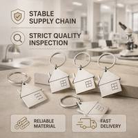 Vente en gros de nouveaux porte-clés personnalisés pour la maison, en acier inoxydable, ronds, modernes, minimalistes et de style luxueux