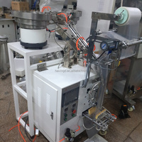 Machine d'emballage de vis entièrement automatique intégrée avec dosage, comptage, fabrication de sacs, remplissage, scellage et processus de découpe de sacs