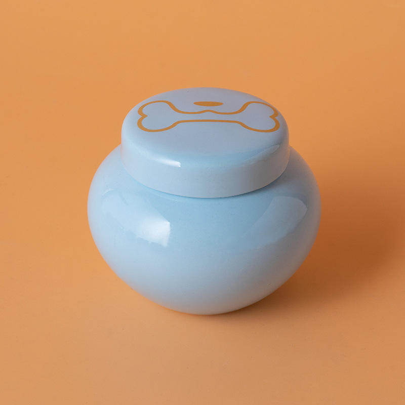 Round ash urn-blue-gold dog chewing bone