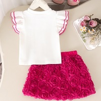 Nouvel ensemble d'été pour filles : T-shirt blanc à manches volantées et jupe rose avec jolis nœuds en coton pour bébés et enfants