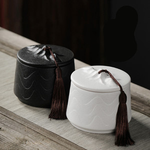 MSH Mountain Shape Lid Matte Ceramic Tea Canister with Embossed Wave Pattern and Tassel Decor Airtight Zen Style Storage Jar - Product Image 3