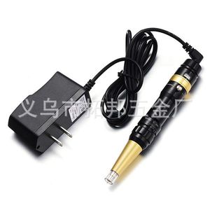 Máquina eléctrica de maquillaje permanente, cuerpo dorado y negro, con adaptador de corriente, para tatuaje de cejas, labios y delineado de ojos. - Product Image 1