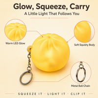 Porte-clés LED lumineux en forme de boulette vapeur, jouet anti-stress avec chaîne à billes, breloque lumineuse à presser pour enfants et filles