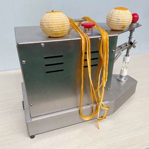 Petit éplucheur de fruits motorisé pour citron, orange et kaki - Product Image 1