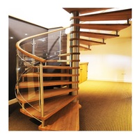 Tangga Spiral Indoor Elegan Desain Helikal dengan Struktur Baja dan Anak Tangga Kayu Solid untuk Interior Mewah