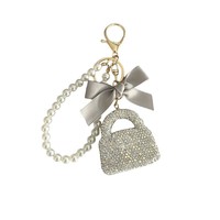 Breloque de sac de style créateur, petite pochette parfumée, autocollant style Ins, cordon à diamants, porte-clés de sac à main avec diamants simulés, design de niche