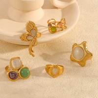 Bague pour femme en acier inoxydable, style œil de chat, avec pierre cabochon, design aile et nœud doré, ouverte et réglable, vintage, vente en gros