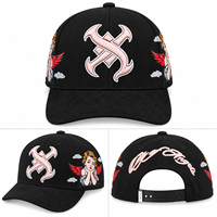 Casquette de baseball noire personnalisée avec lettres abstraites brodées, patch dessin animé, détails en strass, visière incurvée, style streetwear, vente en gros OEM