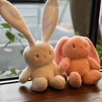 Jouet en peluche lapin mignon multicolore à tirer, lapin à longues oreilles en peluche pour cadeaux d'enfants et machine à grue