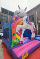 Château gonflable commercial extérieur sur le thème des bonbons rose avec toboggan gonflable pour location de fête pour enfants