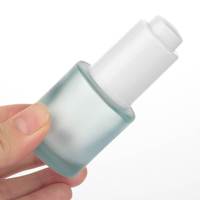 Flacon compte-gouttes en verre mat de 20 ml et 30 ml avec bouton poussoir et impression sérigraphique pour crème de soin et sérum cosmétique