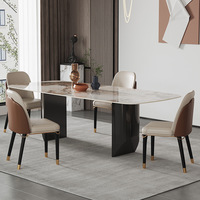 Ensemble de table à manger rectangulaire européenne de luxe 2,4 m 10 places 6 chaises Table basse en marbre de pierre rocheuse en acier inoxydable pour salle à manger