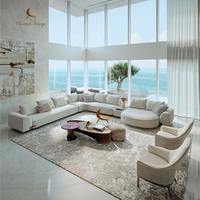 Canapé modulable de designer incurvé, rembourré et à assise profonde, personnalisé pour hall d'hôtel, penthouse et mobilier de resort