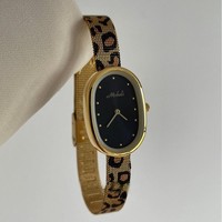 Montre Melissa Leopard élégante pour femme avec bracelet en maille, luxe léger, étanche, best-seller transfrontalier, vente en gros