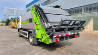 Camion à ordures compacté SINOTRUCK 4*2 d'une capacité de 6 m³, conçu pour l'Afrique avec une réduction de 20 %
