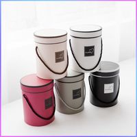 Nouvelle boîte d'emballage d'arrangement de fleur de seau de câlin petite boîte de fleur ronde de Style européen avec poignée