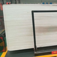 Carreaux de marbre naturels de veines de bois de teck blanc de source fiable coupés à la taille