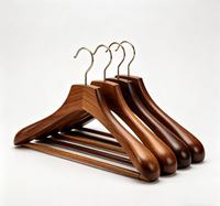 Cintre en bois de lotus noir de qualité supérieure pour costumes, antidérapant, avec logo personnalisé, pour hôtel, en bois de hêtre, avec pince à costume en bois de lotus