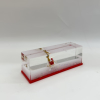 Presse-papiers liquide transparent en acrylique avec figurine flottante miniature, motif Père Noël, marque EAGLE, souvenir d'attraction touristique