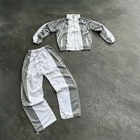 Ensemble survêtement homme en nylon avec logo personnalisé, veste coupe-vent et pantalon de survêtement, fermeture éclair, imperméable, survêtement premium pour homme
