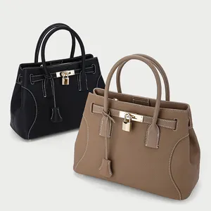 Vente en gros en usine sac fourre-tout tendance pour filles sac à main luxe à bandoulière personnalisé nouvel arrivage de sac à main avec cadenas en cuir végan pour femmes