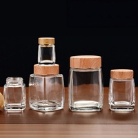 50ml 100ml 180ml 280ml 360ml 500ml 750ml Stoples Madu Kaca Persegi dengan LOGO Kustom, Stoples Kaca Persegi untuk Makanan dengan Tutup Bambu Tutup Logam