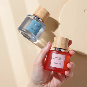 Mükemmel toptan cam parfüm şişesi Modern yuvarlak buzlu parfüm kalın alt şeffaf tasarım 30ml 50ml özel - Product Image 1