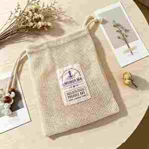 Bolsa de malla de algodón orgánico impresa a máquina, la más vendida, con doble cordón y borlas de cuentas de madera, cierre ajustable; 100% algodón - Product Image 3