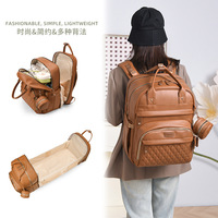 Sac à langer multifonctionnel en cuir PU, sac à dos pour maman avec lit bébé pliable et rideau pare-soleil pour les mamans