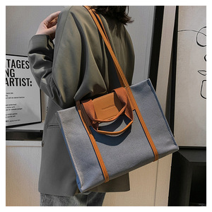 กระเป๋าถือแบบพกพาใหม่ล่าสุด กันน้ำ พร้อมโลโก้สั่งทำ หนัง PU สีต่างๆ สำหรับผู้หญิง แบรนด์ Tanjing - Product Image 6