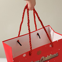 Neue Weihnachtsgeschenktüten mit Handgriff Cartoon-Süßigkeitentaschen Weihnachtsmann Weißer Karton Heißgeprägt Sofort Lieferbar