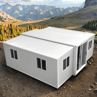 Maison conteneur pliable de 40 pieds sur 30 pieds, panneaux sandwich, design moderne, structure en acier durable, résistante aux ouragans, hôtel, appartement