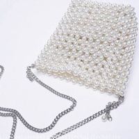 Nouveau sac seau tendance pour femme, en cuir de poisson texturé, orné de perles blanches, style féerique, avec chaîne bandoulière, porté épaule ou à la main, style urbain