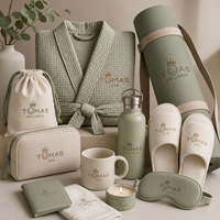 Ensemble souvenir d'hôtellerie VIP haut de gamme avec flacon, journal de voyage, pochette et bougie pour suites d'hôtel et invités d'élite