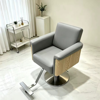 Nouvelle chaise de barbier ergonomique en cuir avec pompe hydraulique rotative et repose-pieds réglable pour salons de coiffure - Direct Usine