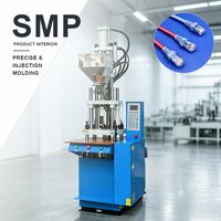 Machine de moulage par injection verticale robuste 35T pour la fabrication de fiches de câbles d'alimentation, adaptateurs CC, connecteurs et moules d'injection PVC
