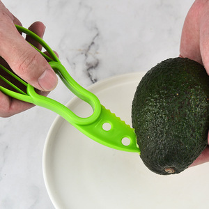 <b>Multifunctional</b> Easy to Use Green Plastic Avocado Knife 3-In-1 Avocado Slicer <b>Cutter</b> for Kitchen - Product Image 4