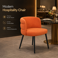 Fauteuil Boucle en corail, dossier enroulé avec assise rembourrée fine sur pieds coniques Raven, idéal pour salle à manger décontractée et salle de thé de l'après-midi