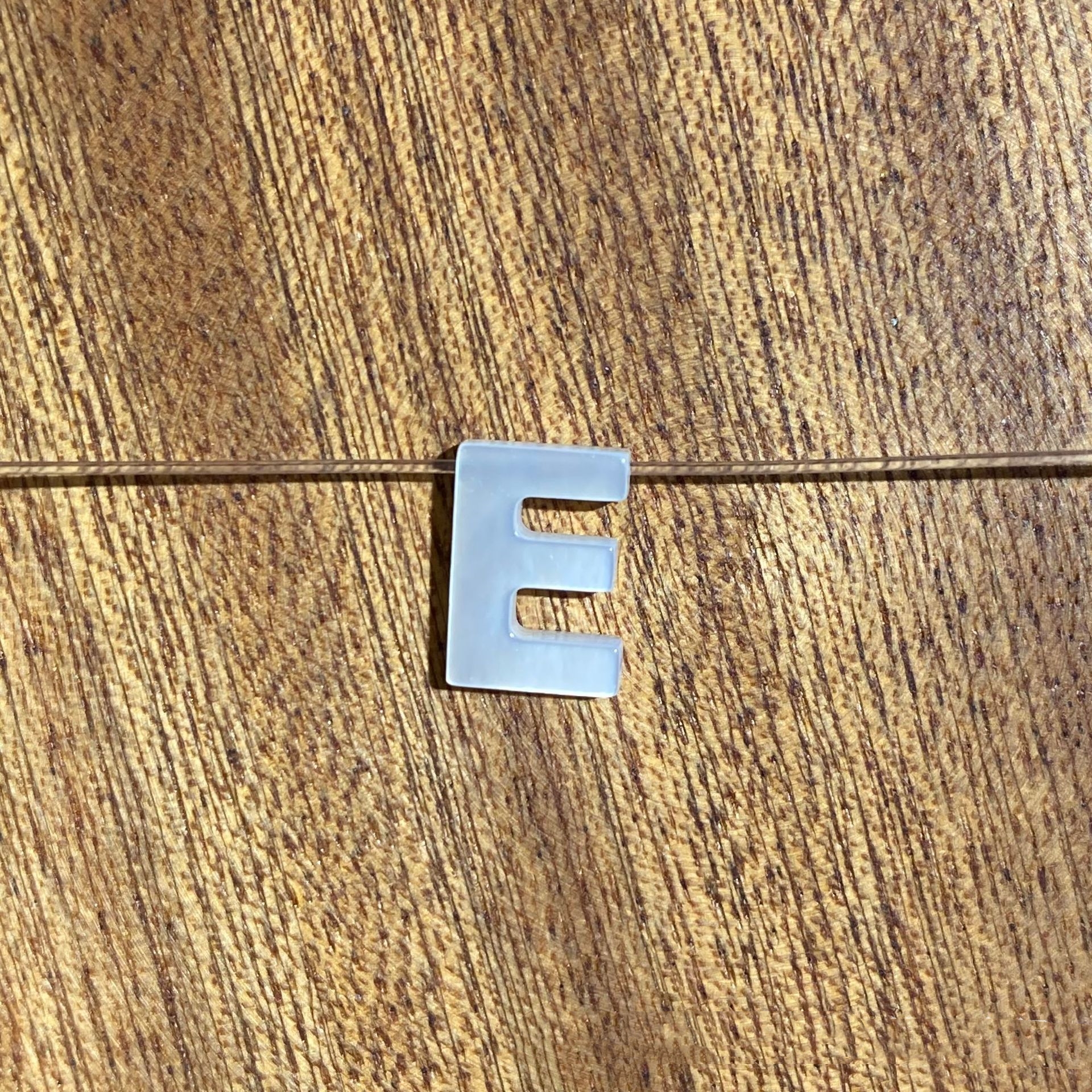 E