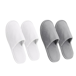 Chaussons d'hôtel jetables écologiques à prix bas du fabricant, semelle antidérapante, EVA souple, logo personnalisé OEM, couleur blanche, pour hommes et femmes - Product Image 1