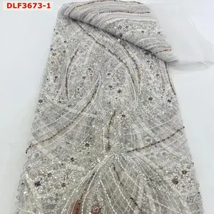 China Factory Customized New Beaded Embroidery Fabric with Sequin Sustainable Mesh Lace for Wedding Dresses Tulle Lace Fabric