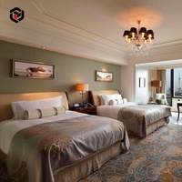 Ensemble de meubles de chambre à coucher d'hôtel 5 étoiles personnalisable en bois massif sculpté de fleurs et en métal moderne