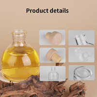 Bouteille diffuseur de parfum en verre vide avec logo personnalisé, conteneur rond pour parfum avec bouchon en bois pour la décoration intérieure – Fournisseur d'usine