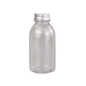 Bottiglie di succo di plastica vuote di vendita calde bottiglie di succo di plastica per bevande in PET trasparenti di forma rotonda personalizzate in PET