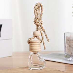 Mini botella de Perfume de vidrio portátil con forma de corazón de 6ml, difusor de Perfume colgante para coche de aromaterapia con tapa difusora de madera - Product Image 5